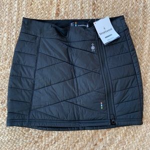 Brand new, unworn Smartwool snow skirt, black